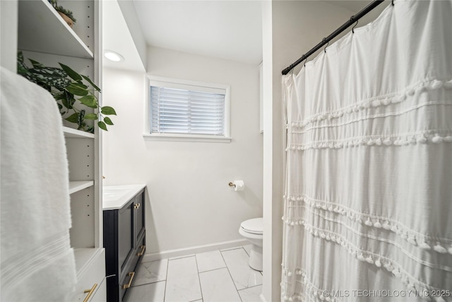 full bath with baseboards, toilet, vanity, marble look tiles, and a shower with curtain