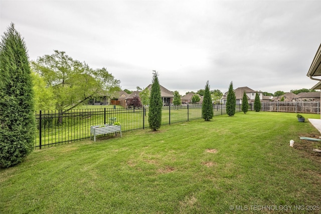view of yard featuring a residential view