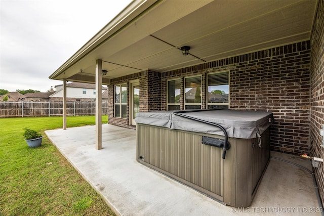 view of patio / terrace featuring a hot tub