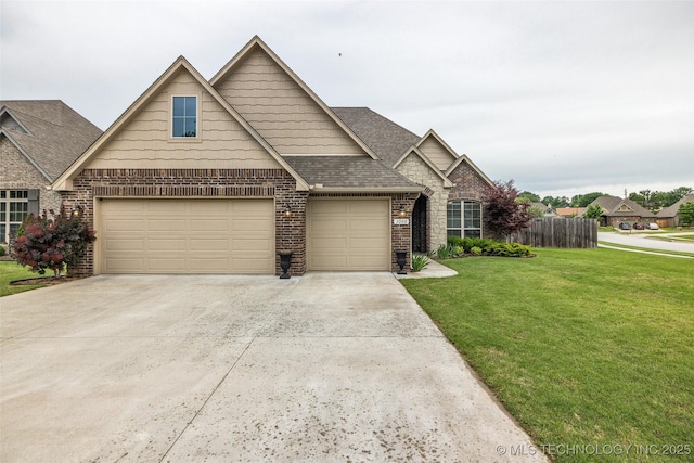 traditional-style home with driveway, brick siding, a garage, and a shingled roof