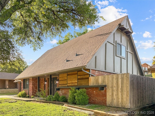 view of front of house with brick siding