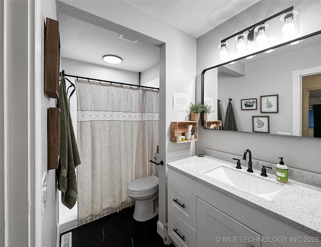 full bath featuring toilet, vanity, and curtained shower