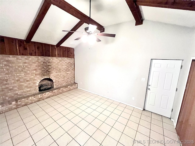 unfurnished living room featuring ceiling fan, light tile patterned floors, and a brick fireplace