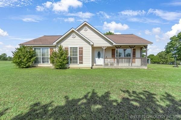 10718 W 162nd St, Skiatook, OK 74070 - back of house with a porch and a yard