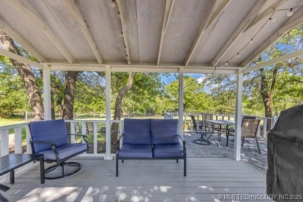 10718 W 162nd St, Skiatook, OK 74070 - sunroom / solarium featuring outdoor dining area, an outdoor hangout area, and vaulted ceiling