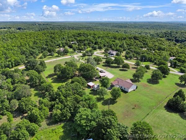 10718 W 162nd St, Skiatook, OK 74070 - drone / aerial view of a heavily wooded area