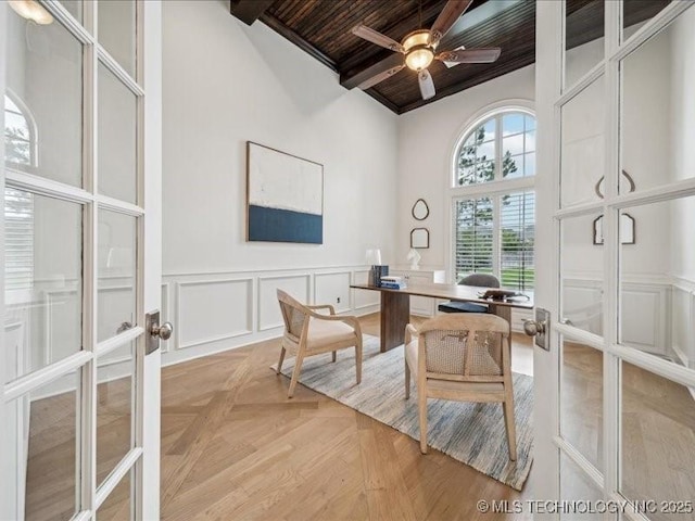 4301 S Mimosa Ave, Broken Arrow, OK 74011 - office area with ceiling fan, french doors, wood ceiling with exposed beams, high vaulted ceiling, and a decorative wall