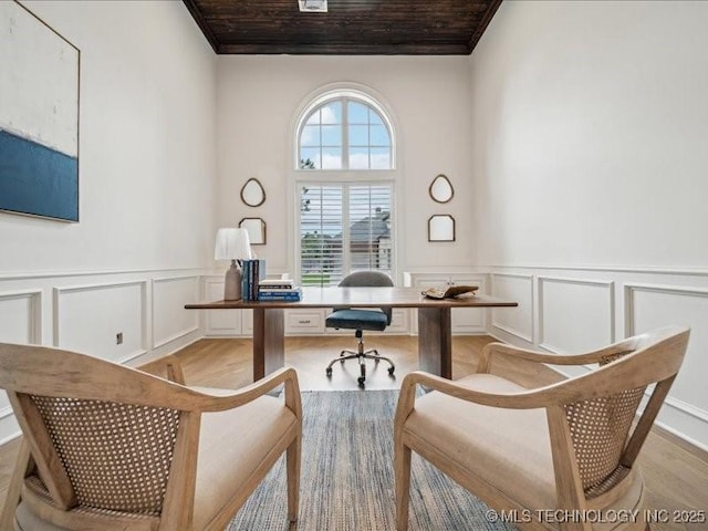 4301 S Mimosa Ave, Broken Arrow, OK 74011 - office area with a decorative wall, wooden ceiling, crown molding, wainscoting, and light wood finished floors