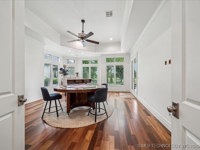 4301 S Mimosa Ave, Broken Arrow, OK 74011 - dining space with wood finished floors, ornamental molding, a ceiling fan, a raised ceiling, and baseboards