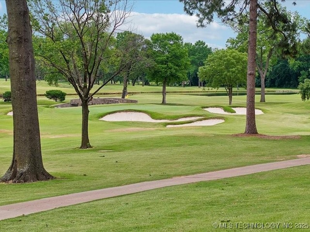 4301 S Mimosa Ave, Broken Arrow, OK 74011 - surrounding community featuring golf course view, a lawn, and view of scattered trees
