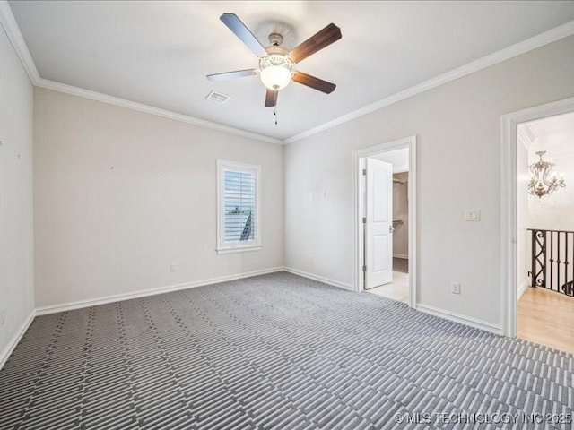 4301 S Mimosa Ave, Broken Arrow, OK 74011 - unfurnished bedroom with carpet floors, crown molding, baseboards, ceiling fan, and a walk in closet
