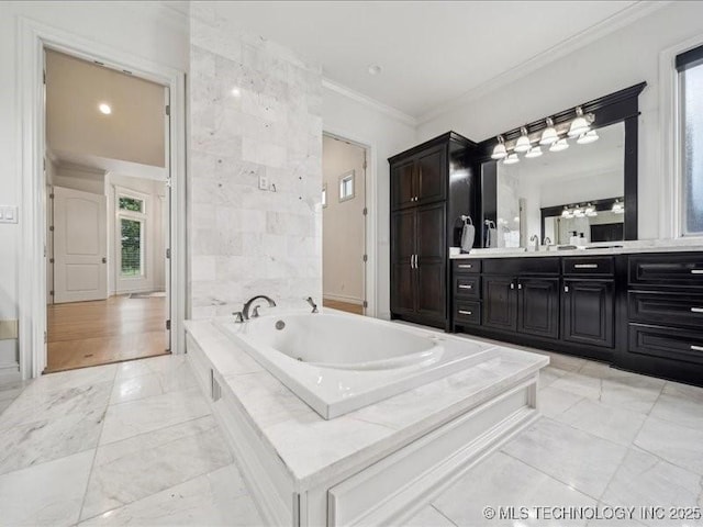 4301 S Mimosa Ave, Broken Arrow, OK 74011 - bathroom featuring ornamental molding, marble look tiles, a bath, and vanity