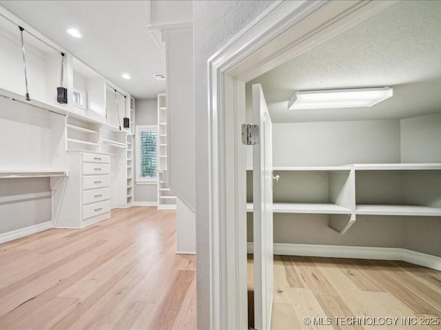 4301 S Mimosa Ave, Broken Arrow, OK 74011 - spacious closet with light wood-style flooring