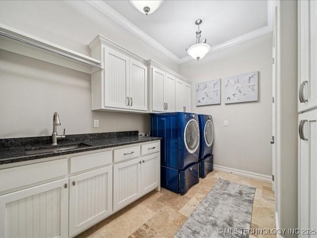 4301 S Mimosa Ave, Broken Arrow, OK 74011 - laundry area featuring washing machine and clothes dryer, cabinet space, ornamental molding, and light stone finish flooring