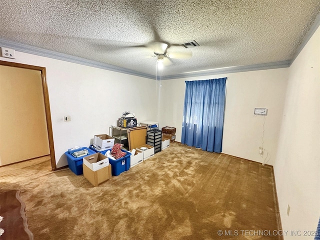 miscellaneous room with carpet floors, ornamental molding, a ceiling fan, and a textured ceiling