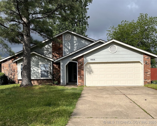 view of front of property featuring brick siding, concrete driveway, a garage, and a front yard