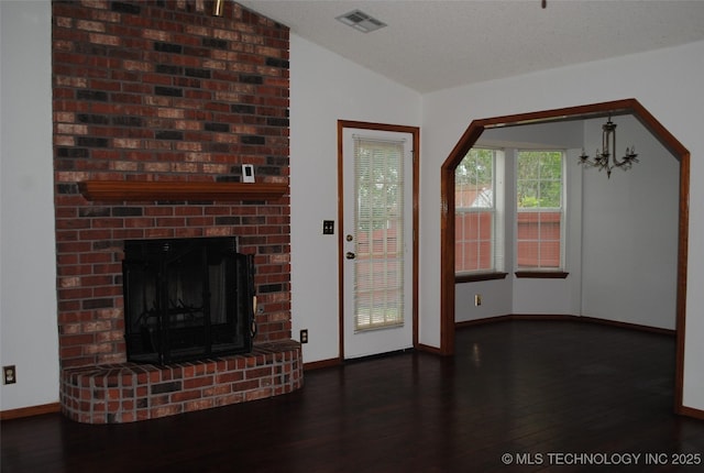 9908 S 95th E Ave, Broken Arrow, OK 74133 - unfurnished living room with lofted ceiling, wood finished floors, a fireplace, baseboards, and a chandelier