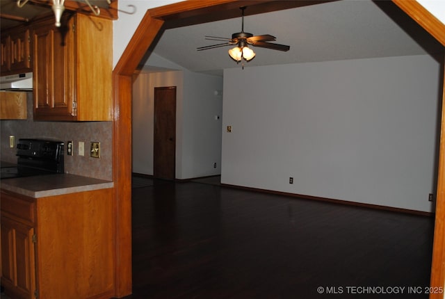 9908 S 95th E Ave, Broken Arrow, OK 74133 - kitchen with under cabinet range hood, baseboards, decorative backsplash, ceiling fan, and electric range