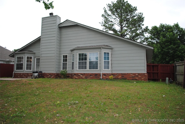 9908 S 95th E Ave, Broken Arrow, OK 74133 - rear view of house featuring a chimney