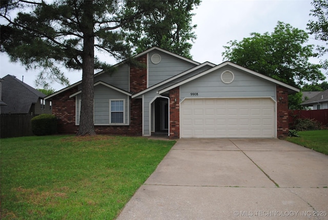 9908 S 95th E Ave, Broken Arrow, OK 74133 - view of front of house with brick siding, concrete driveway, and an attached garage