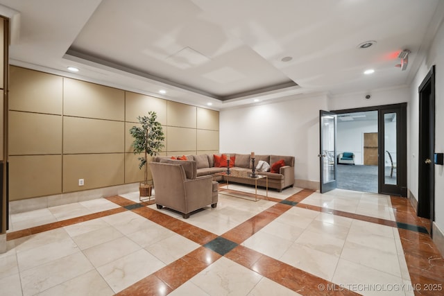 lobby with recessed lighting and crown molding