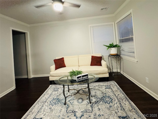 3922 S Norfolk Ave, Tulsa, OK 74105 - living room with baseboards, wood finished floors, ornamental molding, a ceiling fan, and a textured ceiling