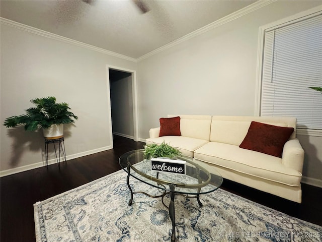 3922 S Norfolk Ave, Tulsa, OK 74105 - living area with crown molding, wood finished floors, and baseboards