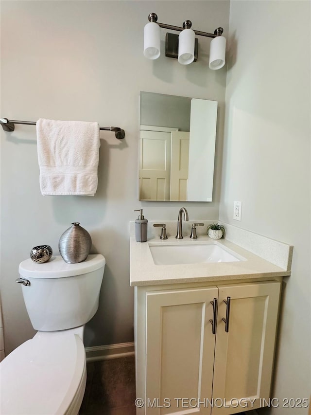 3922 S Norfolk Ave, Tulsa, OK 74105 - half bathroom featuring toilet and vanity