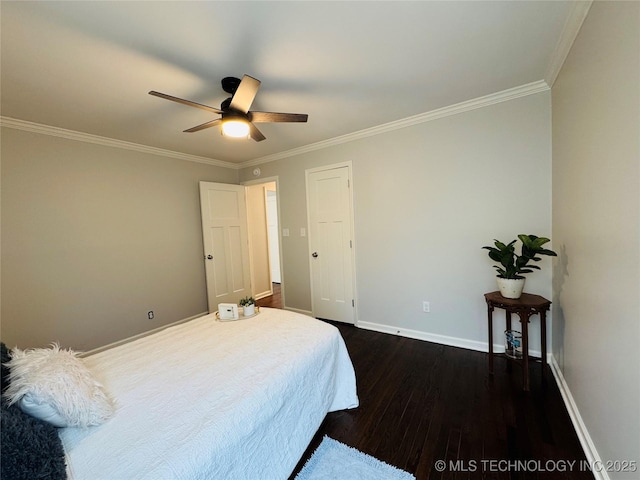 3922 S Norfolk Ave, Tulsa, OK 74105 - bedroom featuring crown molding, dark wood-style floors, baseboards, and a ceiling fan