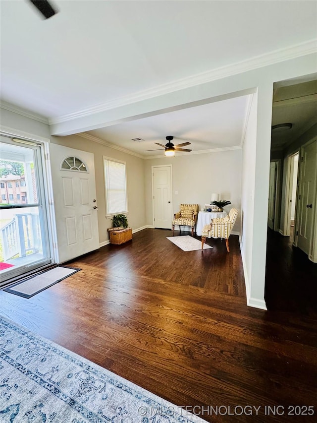 3922 S Norfolk Ave, Tulsa, OK 74105 - foyer featuring wood finished floors, crown molding, baseboards, and ceiling fan