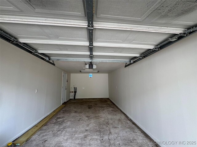 3922 S Norfolk Ave, Tulsa, OK 74105 - garage featuring a garage door opener