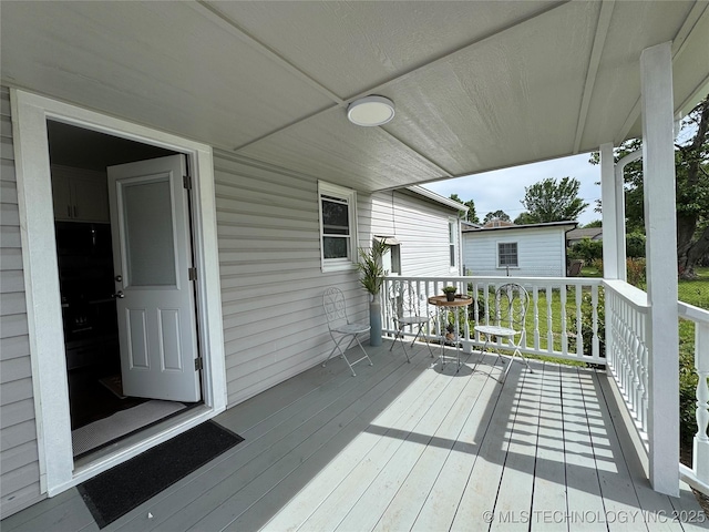 3922 S Norfolk Ave, Tulsa, OK 74105 - view of wooden porch