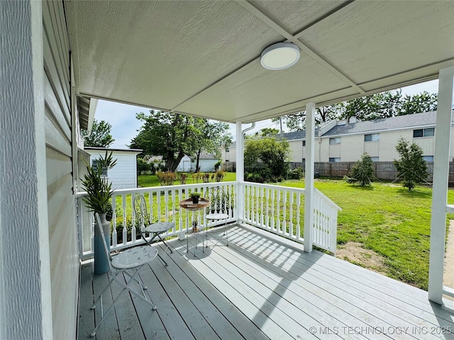 3922 S Norfolk Ave, Tulsa, OK 74105 - wooden porch with a lawn