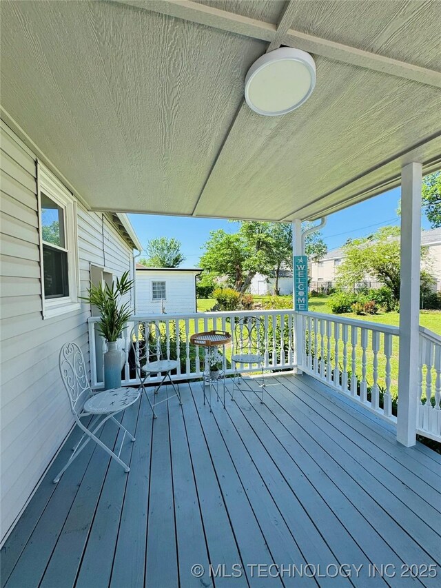 3922 S Norfolk Ave, Tulsa, OK 74105 - view of wooden porch