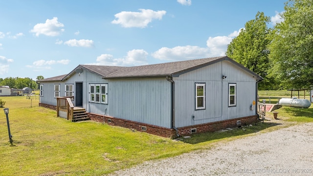 11462 Red Fox Ln, Sperry, OK 74073 - view of side of property featuring crawl space and a shingled roof