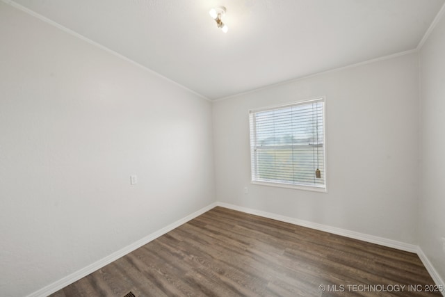 11462 Red Fox Ln, Sperry, OK 74073 - unfurnished room with dark wood-style flooring, crown molding, and baseboards