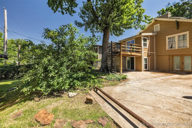 1516 S Elwood Ave, Tulsa, OK 74119 - view of yard with a patio, french doors, a deck, and stairs