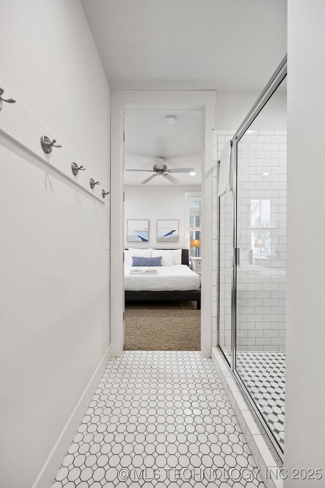 43 Center Ln S, Carlton Landing, OK 74432 - full bathroom featuring ensuite bathroom, a shower stall, ceiling fan, and baseboards