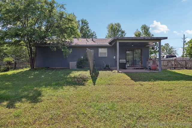 rear view of property with a patio area