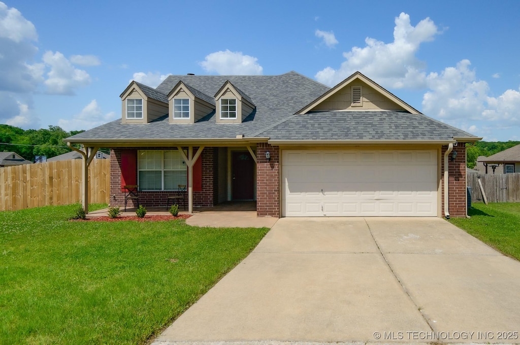 view of front of property featuring brick siding, an attached garage, concrete driveway, and roof with shingles