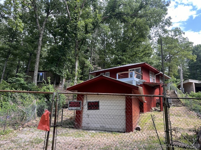 140 Oaks Rd, Eucha, OK 74342 - view of side of home featuring a gate and fence