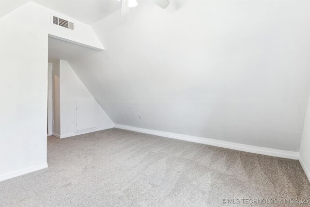 3909 W Utica St, Broken Arrow, OK 74011 - empty room with carpet floors, ceiling fan, baseboards, and vaulted ceiling