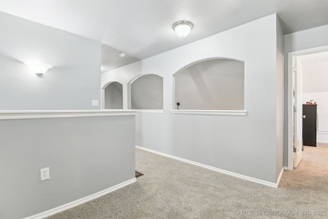 3909 W Utica St, Broken Arrow, OK 74011 - hallway featuring carpet floors and baseboards