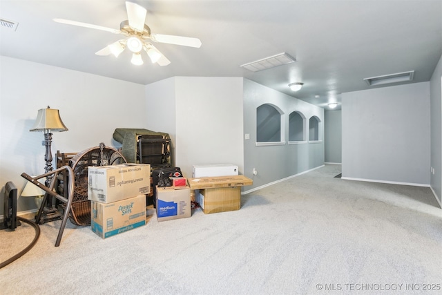 bonus room with carpet flooring, a ceiling fan, and baseboards