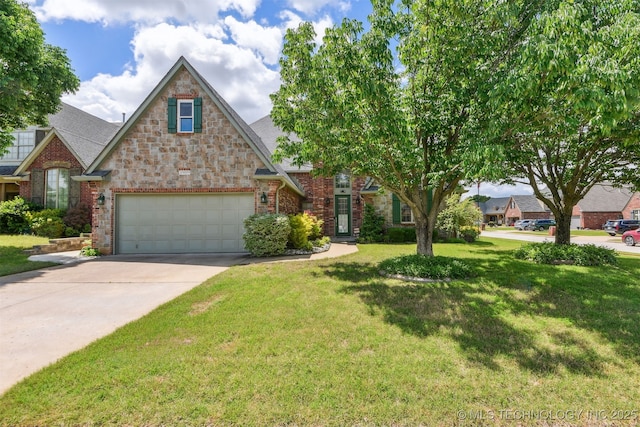 view of front of home featuring concrete driveway, a front lawn, an attached garage, brick siding, and stone siding