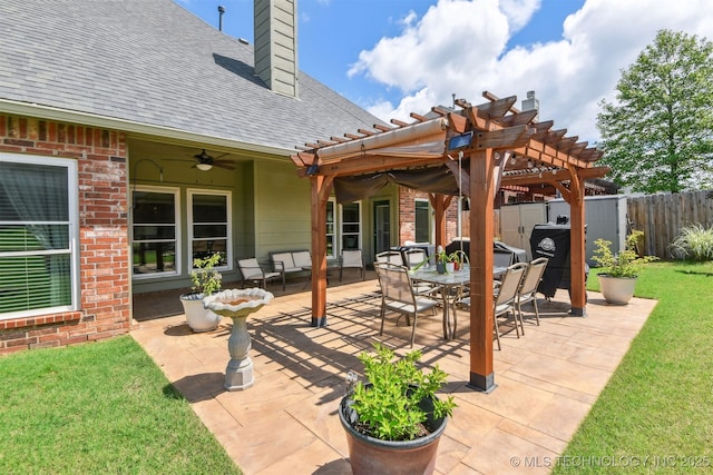 view of patio featuring a pergola, outdoor dining space, and ceiling fan