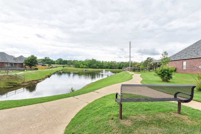 view of home's community featuring a water view