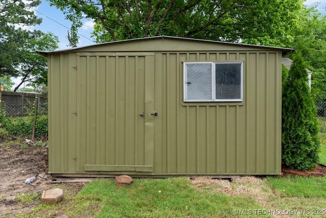 4723 E 8th St, Tulsa, OK 74112 - view of shed featuring fence