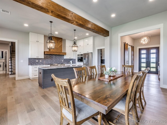 3241 E 171st St S, Bixby, OK 74008 - dining area with beamed ceiling, light wood finished floors, recessed lighting, french doors, and baseboards