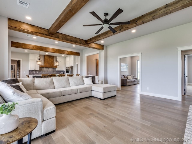 3241 E 171st St S, Bixby, OK 74008 - living room with beam ceiling, a ceiling fan, light wood-type flooring, recessed lighting, and baseboards